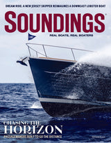 Magazine cover with a boat in the water and 'Soundings' branding.