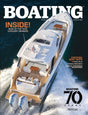 Magazine cover featuring a luxury yacht with text about 'Boating' magazine.