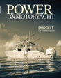 Magazine cover featuring a powerboat with 'Power & Motoryacht' branding.
