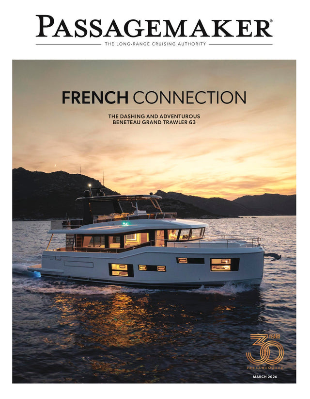 Yacht on water with 'Passagemaker' magazine cover text