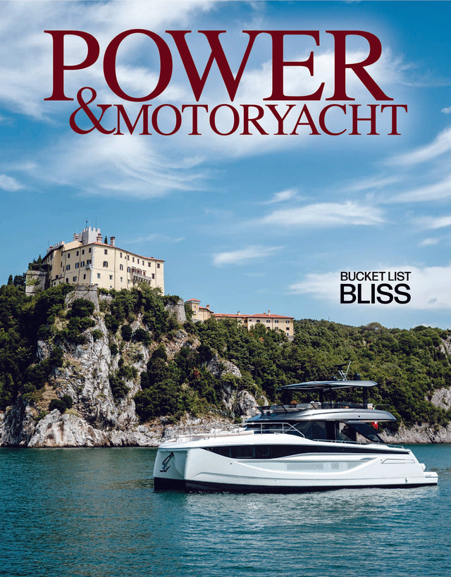 Yacht on a body of water with a scenic background and 'Power & Motoryacht' text.