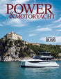 Yacht on a body of water with a scenic background and 'Power & Motoryacht' text.