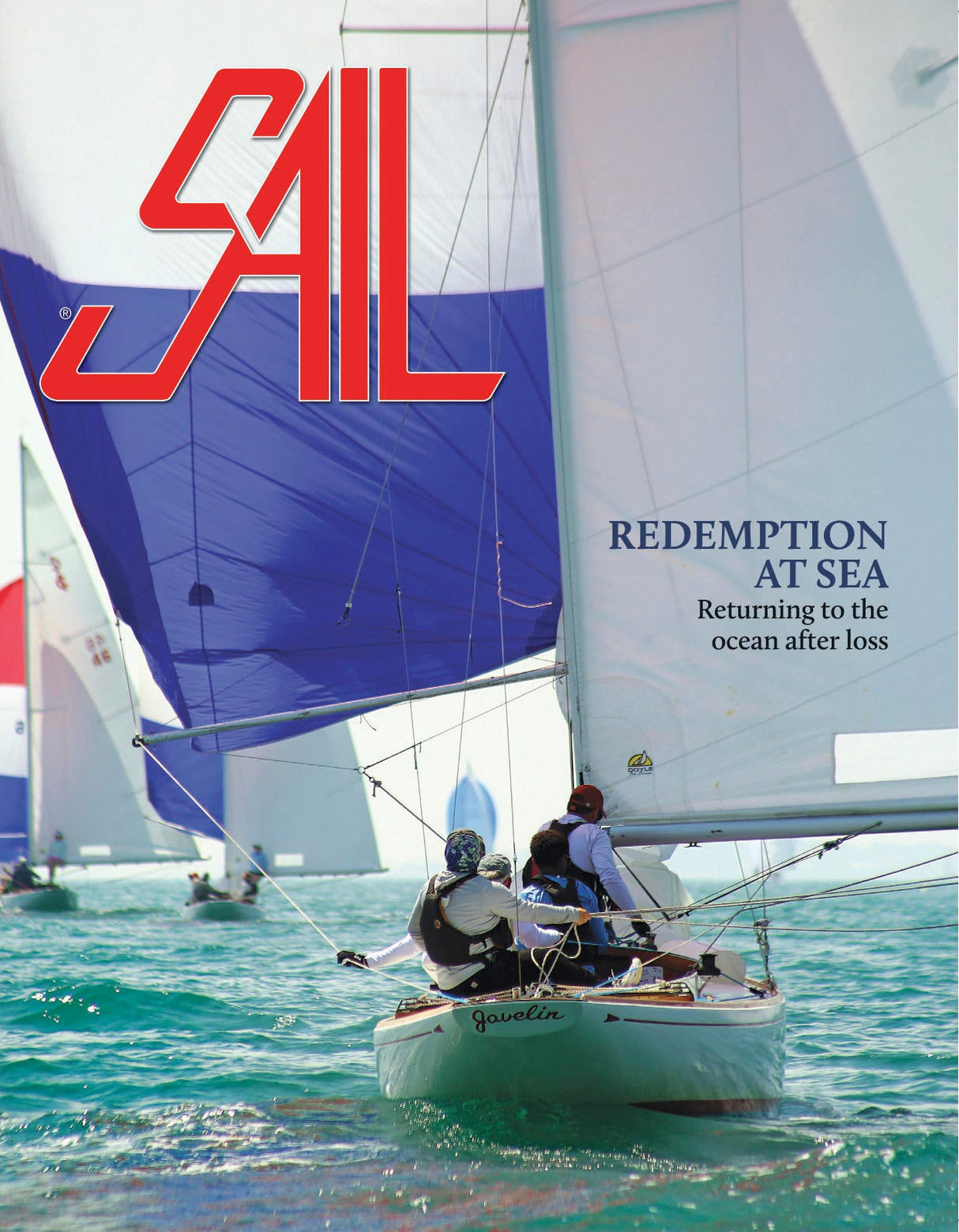 Sailing magazine cover with sailboats on the water and 'SAIL' logo.
