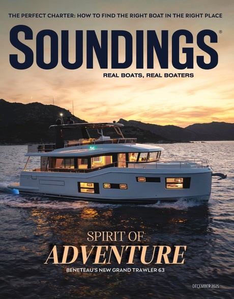 Magazine cover featuring a boat with 'Soundings' branding and a sunset over water.