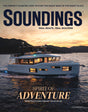 Magazine cover featuring a boat with 'Soundings' branding and a sunset over water.