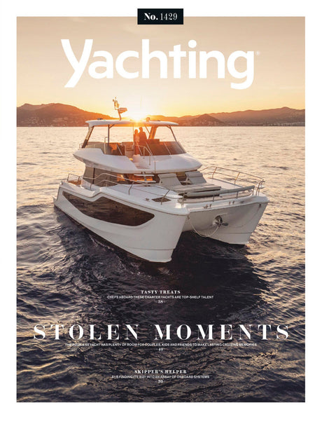 Yachting magazine cover with a boat on the water at sunset