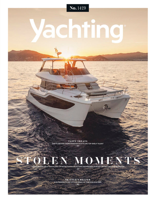 Yachting magazine cover with a boat on the water at sunset